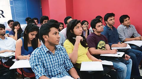9-member panel to examine why the current schooling system increases students' reliance on coaching 