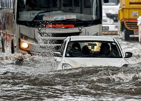 IMD issues red alert for Mumbai and 6 other districts; two dead, flights, trains delayed 
