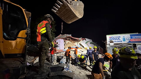 72 dead as powerful quake strikes Central Philippines, search continues