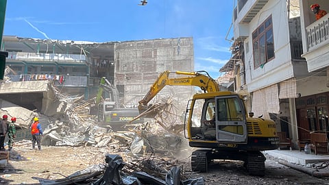Indonesian school collapse: Death toll rises to 49, 14 still missing