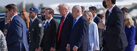Trump lands in Israel as first seven hostages freed by Hamas arrive back in country