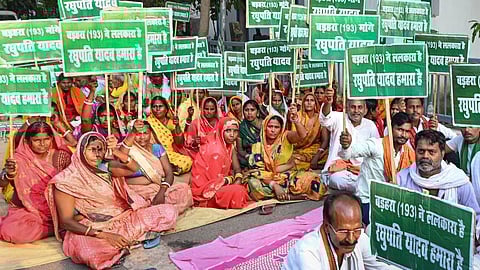 Lalu gives away RJD tickets; stops after Tejashwi's intervention