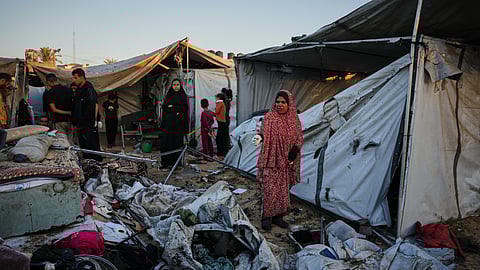 Israel's military says ceasefire is back on as death toll from overnight strikes in Gaza reaches 81