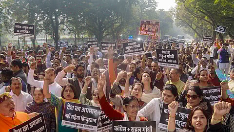 BJP holds demonstration outside Cong office against 'shirtless' protest at AI summit
