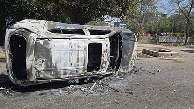 Cars burnt, stones thrown as Noida workers protest for better pay