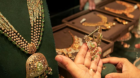 Gold flat at Rs 1.62 lakh/10g; silver edges higher on import curbs