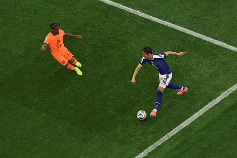 Daichi Kamada's late header gives Japan a 2-2 draw with the Netherlands 
