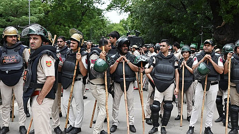 Cops await Centre's orders on withdrawing FIRs against protesters after Dharmendra Pradhan's exit
