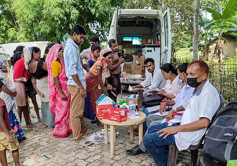 Sur Bahini members collect donations for the flood-affected people, in Guwahati, on Sunday | PTI