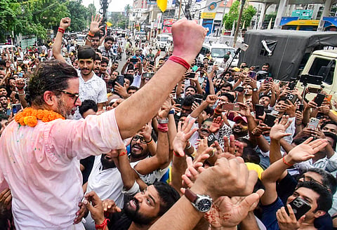 Jan Suraaj Party chief Prashant Kishor celebrates with supporters after winning the Bankipur Assembly by-election, in Patna, on Monday | PTI