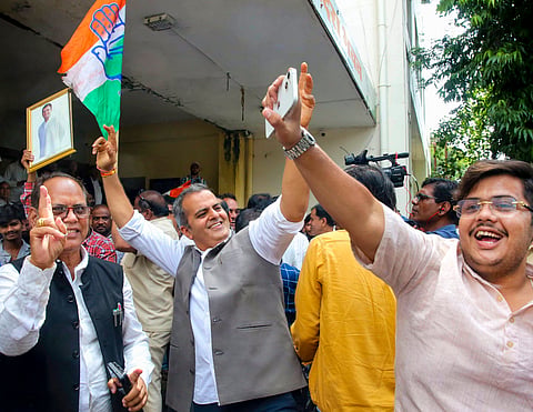 Congress workers celebrate the party's victory in the Datia Assembly by-election at the Pradesh Congress Committee headquarters, in Bhopal, on August 3 | File image/PTI