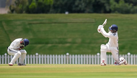 East Zone's Sudip Kumar Gharami dives for the ball on day three of the Duleep Trophy Semi-final 1 cricket match between Central Zone and East Zone, in Bengaluru, on Tuesday | PTI