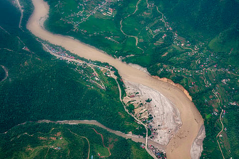 An aerial view of the swollen Trishuli River in the aftermath of the flash floods, near Chitwan, Nepal, on Wednesday | PTI