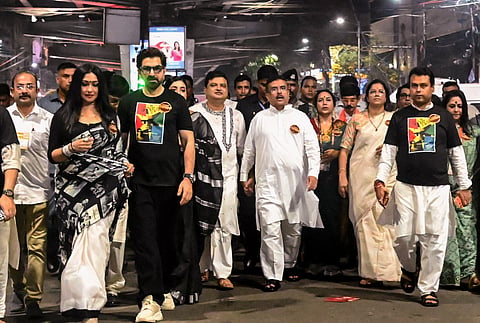 West Bengal CM Suvendu Adhikari alongside Bengali actors Jeet, Rituparna Sengupta, and others participate in a tribute walk on the birth centenary of Uttam Kumar, in Kolkata | File image/PTI