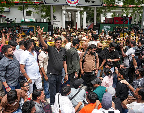 CJP supporters  protest outside Parliament Street Police Station demanding action against Swatantra Bhardwaj over the alleged assault of a student protester's father, in New Delhi, on Friday | PTI