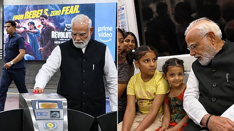 Prime Minister Narendra Modi interacts with kids on the Metro, in New Delhi, on Saturday | PTI