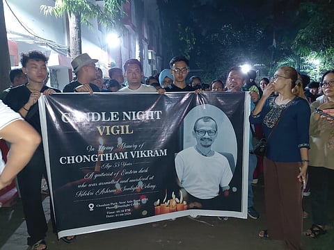 A 54-year-old Manipuri guitarist died after being allegedly attacked by a group in southeast Delhi, prompting a candlelight march by members of the Northeast community | X/@HuidromAthouba