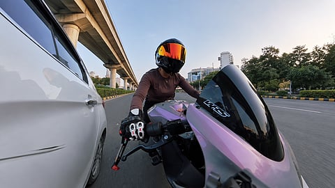 A Gurugram biker has shared action-camera footage of a collision involving her motorcycle, alleging that the car's occupants had been following her before the crash | Instagram/rebelwheels_sia_