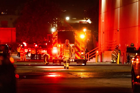 First responders work the scene after a helicopter crashed near a bus crash in Chatsworth, a neighborhood in Los Angeles, on Tuesday | PTI