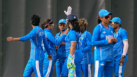 India's Richa Ghosh, Sree Charani and teammates during the Asian Games fourth Women's Quarter final cricket match against Japan, in Nisshin, Japan, on Friday | PTI