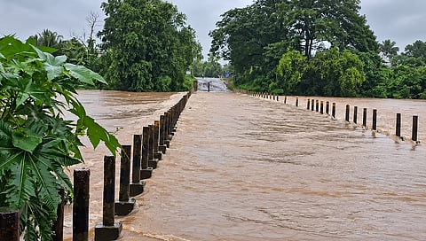 Schools were shut in five Odisha districts and train services disrupted after a deep depression brought heavy rain and landslides to the region | X/ANI