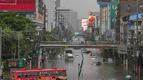 The streets are flooded after heavy rain in Bangkok, Thailand, on Saturday | PTI