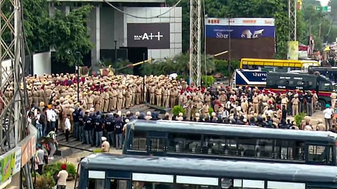 Police personnel stand guard outside the LPU campus, in Phagwara, Kapurthala district, on Monday | PTI