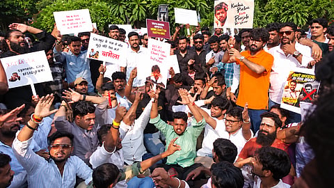 A group of people identifying themselves as members of 'Gen next Mumbai' holds a protest against the Cockroach Janata Party in Mumbai, on Friday | X/ANI