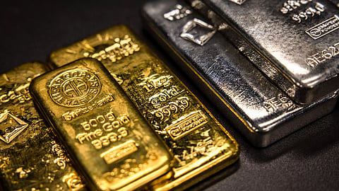 Gold falls 2.4 per cent to Rs 1.47 lakh per 10 grams, while silver plunges 6.4 per cent to Rs 2.11 lakh per kg on MCX