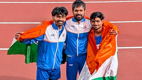 Shailesh Kumar, right, Varun Bhati, centre, and Rahul celebrate after winning gold, silver and bronze medals respectively in the men's high jump T63 event, in Japan | PTI