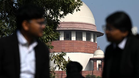 Bench orders restoration of land to original owners, enhances costs to Rs 50,000 per petitioner and rejects procedural objections