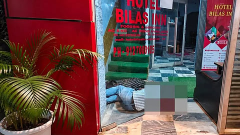 Police link shooting to dispute between hotel owner and leaseholder, recover licensed pistol and arrest one person in connection with incident