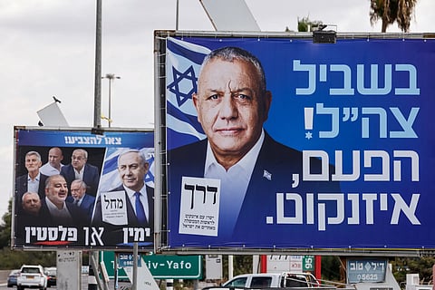 Neither Netanyahu's right-wing alliance nor the opposition bloc was assured of a majority, raising the prospect of prolonged coalition negotiations