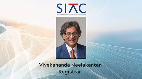  Portrait of Vivekananda Neelakantan, Registrar at the Singapore International Arbitration Centre (SIAC), with the SIAC logo above and a light abstract background.