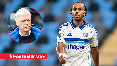 Guela Doue in action for Strasbourg alongside a stern looking David Moyes