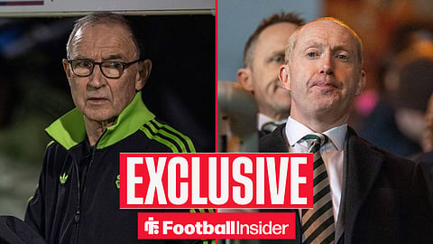 Celtic manager Martin O'Neill left on the touchline looking at director Michael Nicholson