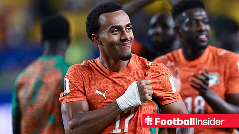 Strasbourg right-back Guela Doue smiles while playing for Ivory Coast
