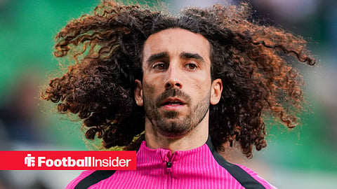 Marc Cucurella in pink Chelsea training gear warming up 