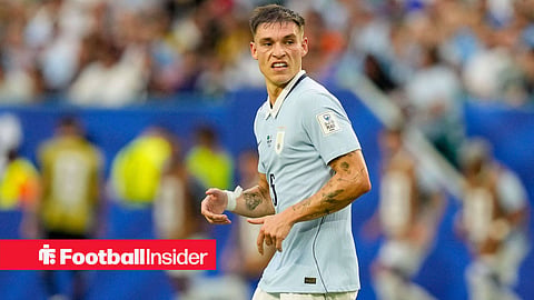 Manuel Ugarte in action for Uruguay during a World Cup match against Saudi Arabia