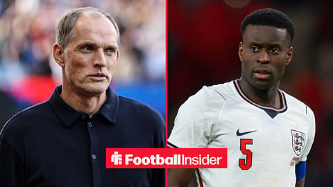 England manager Thomas Tuchel on sideline and player Marc Guehi in action looking at him confused
