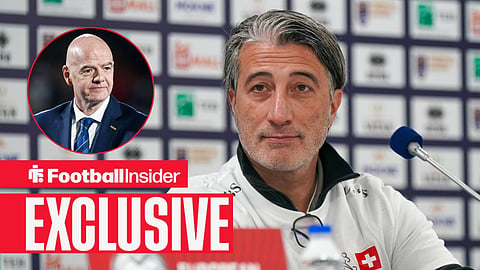 Football Insider exclusive as Switzerland manager Murat Yakin sits in a press conference, while FIFA president Gianni Infantino watches from a circular inset.