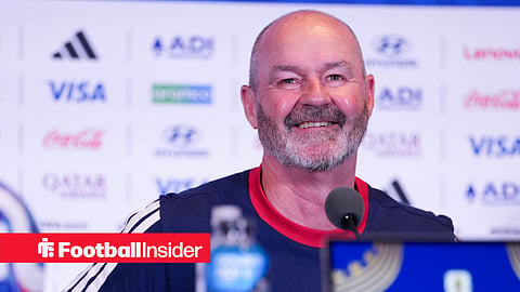 Scotland manager Steve Clarke in a press conference smiling at reporters
