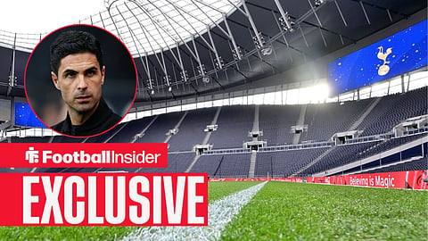 A general view of the Tottenham Hotspur Stadium from the pitch / Arsenal manager Mikel Arteta looks on at the Emirates Stadium