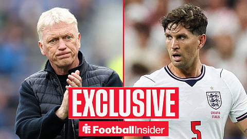 Everton manager David Moyes claps with Manchester City defender John Stones inset