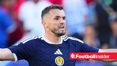 Aston Villa midfielder John McGinn holding his hands out in frustration while playing for Scotland at the 2026 World Cup
