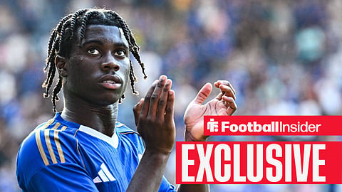 Jeremy Monga clapping while in Leicester City's blue home kit