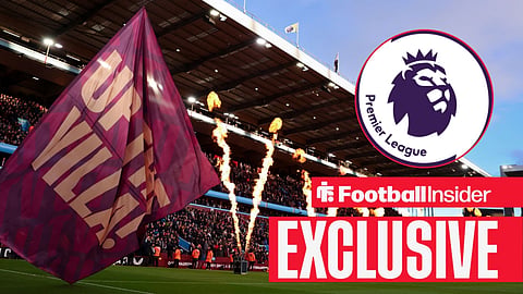 General view of Villa Park with flags and flames ahead of kick-off / Premier League badge