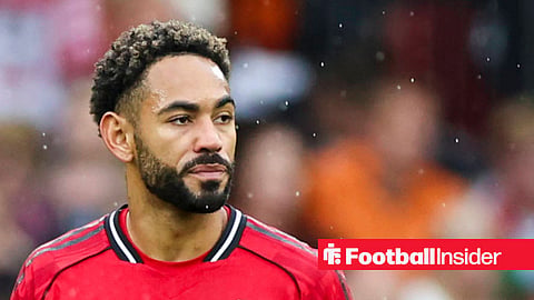Matheus Cunha playing for Manchester United in red home kit