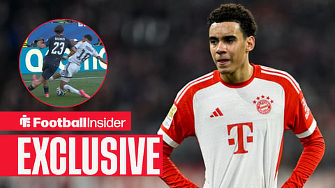 Bayern Munich star Jamal Musiala looks on during a game / Jamal Musiala flies into a reckless challenge on Matias Galarza in Germany's defeat to Paraguay