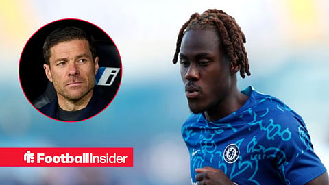 Trevoh Chalobah during a warm-up for Chelsae, with Xabi Alonso in a circular inset